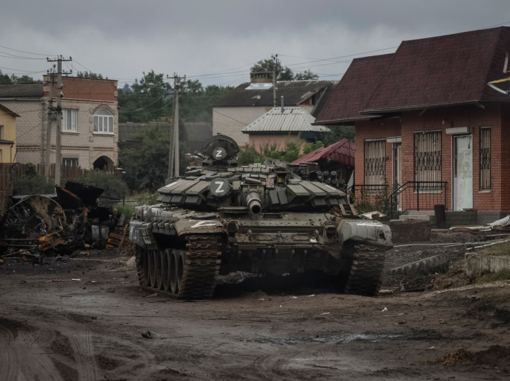 A destroyed Russian tank is seen in the town of Izium