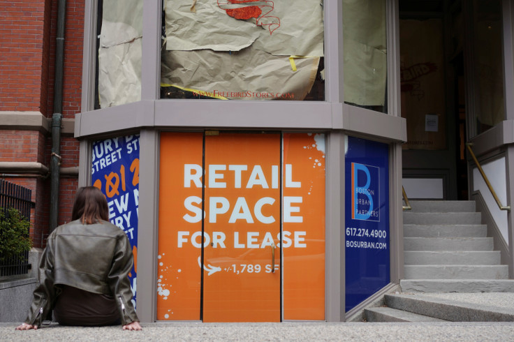 A sign advertises "Retail Space For Lease" in an empty storefront in Boston