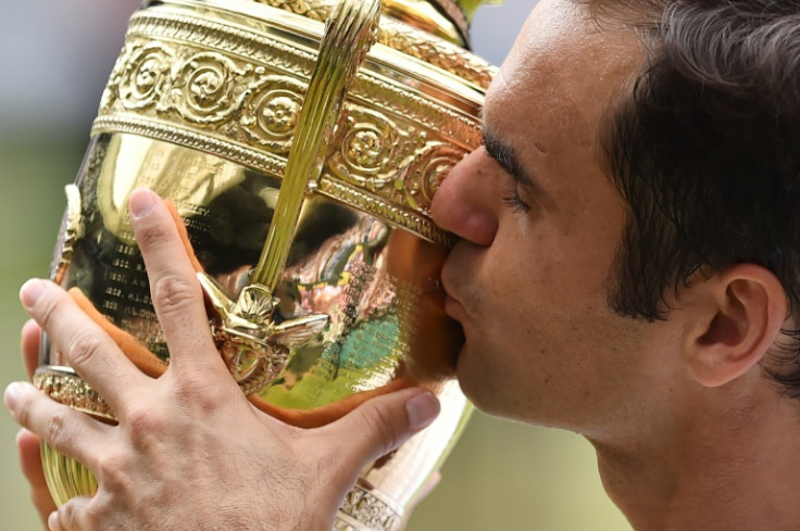 Roger Federer celebrates the last of his eight Wimbledon titles in 2017