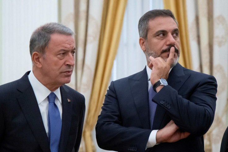 Turkish DefenCe Minister Akar and intelligence chief Fidan are seen before a meeting with Russian President Vladimir Putin in the Kremlin in Moscow