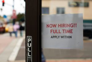 A retail store advertising a full time job on its open door in Oceanside, California