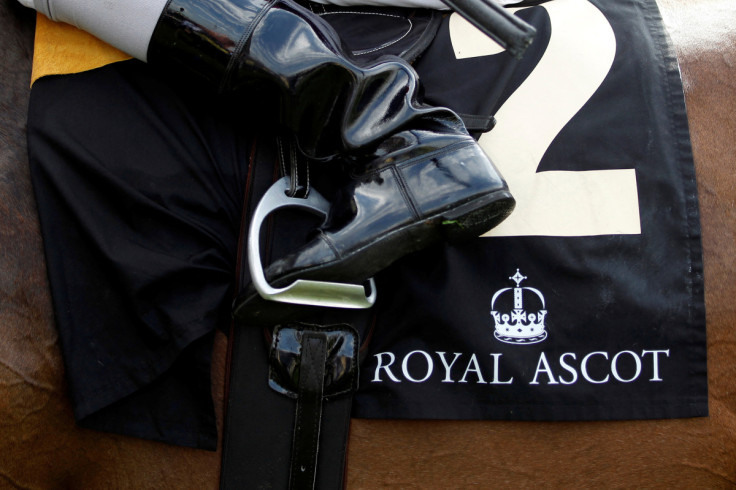 Moore rides Queen Elizabeth's horse Carlton House after The Prince of Wales' Stakes on the second day of racing at Royal Ascot in southern England