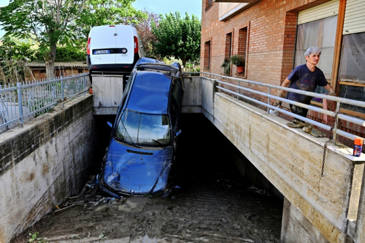 Prime Minister Mario Draghi visited some of those affected by the flooding, which he and others have linked to extreme weather caused by climate change