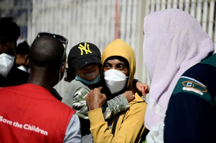 Migrants on the Italian island of Lampedusa, landing point for many of the tens of thousands who reach Italian shores each year from North Africa