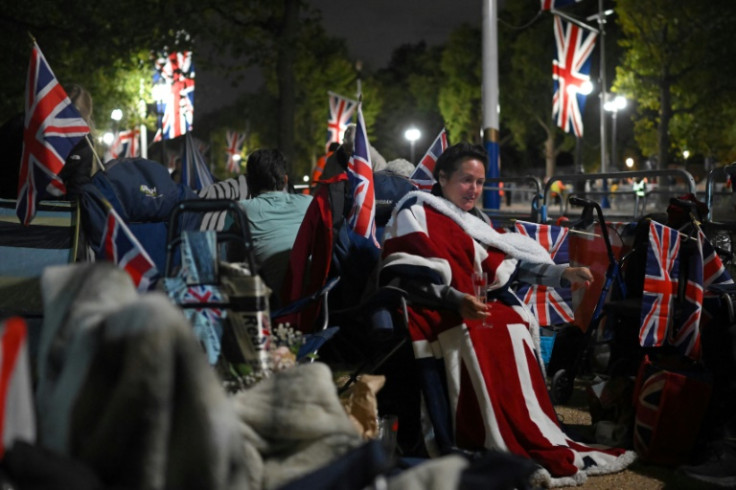 Many people have camped out for days to secure a spot to see the funeral procession