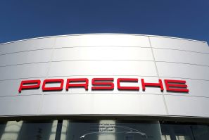 A logo of Porsche is seen outside a Porsche car dealer, amid the coronavirus disease (COVID-19) outbreak in Brussels