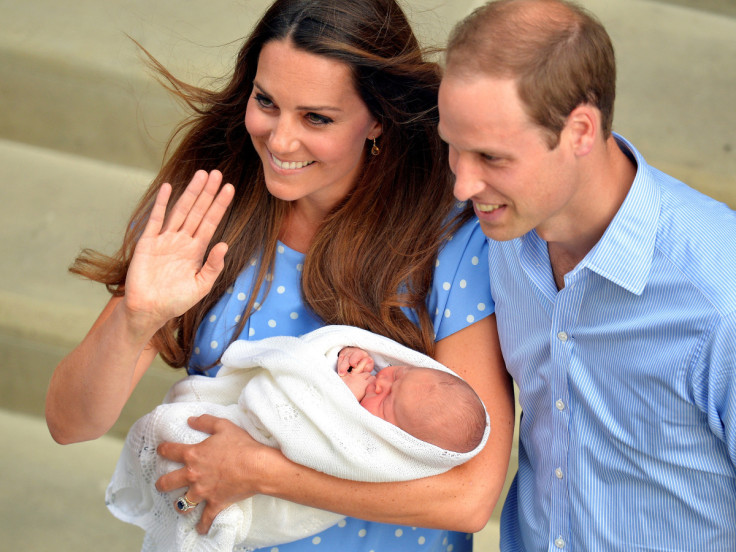 Britain's Catherine, Duchess of Cambridge, holds her baby son outside the Lindo Wing of St Mary's Hospital before leaving with Prince William, in central London