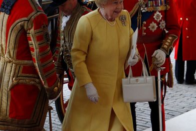 Britain's Queen Elizabeth arrives at Buckingham Palace after the wedding ceremony of Britain's Prince William and Catherine, Duchess of Cambridge, in central London