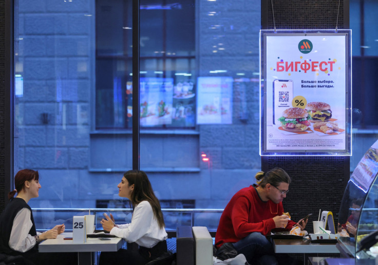 People visit the fast food restaurant Vkusno & tochka in Moscow