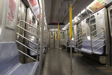 FILE PHOTO - An empty subway car is seen during the morning rush, following the outbreak of Coronavirus disease (COVID-19), in New York