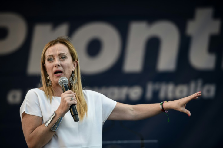 Brothers of Italy leader Giorgia Meloni addresses supporters during a rally, her election slogan "Pronti", or "Ready", behind her