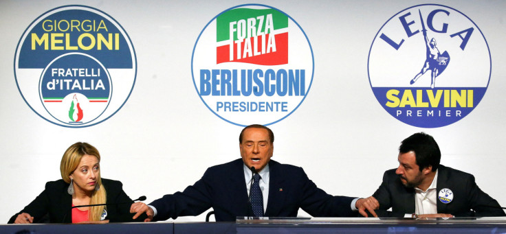 Forza Italia leader Silvio Berlusconi speaks flanked by Fratelli D'Italia party leader Giorgia Meloni and Northern League leader Matteo Salvini during a meeting in Rome