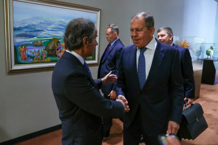 In this handout photo from the Russian Ministry of Foreign Affairs, Russian Foreign Minister Sergey Lavrov (right) meets IAEA Director General Rafael Grossi during the UN General Assembly to discuss the safety of Ukraine's nuclear facilities