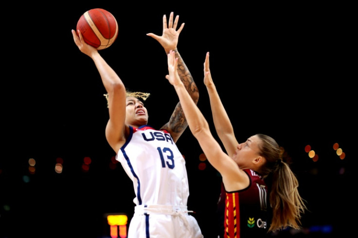 Shakira Austin of the USA (L) goes up against  Belgium's Laure Resimont in Sydney
