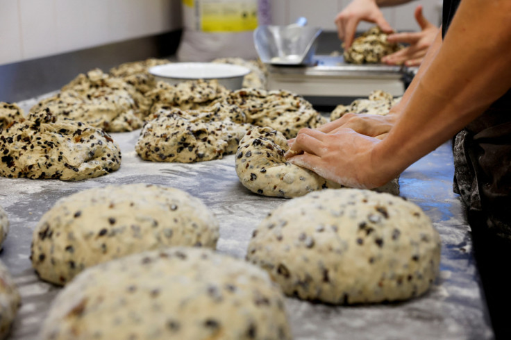 An employee prepares bread at a bakery in Hoevelaken