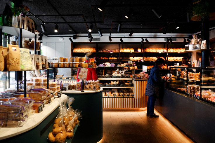 A customer buys bread at a bakery in Hoevelaken