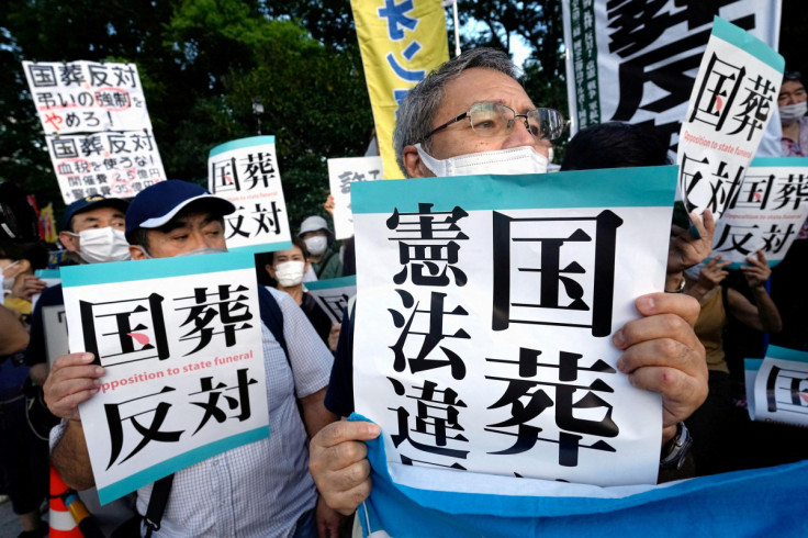 People stage a protest in front of the main gate of Japan's parliament building against the state paying for assassinated former Prime Minister Shinzo Abe's funeral in Tokyo