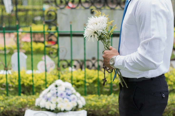 A man with flowers.