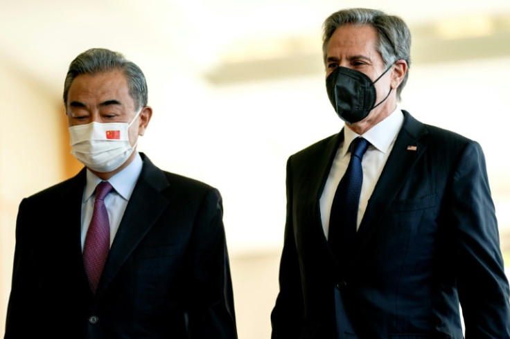 US Secretary of State Antony Blinken walks with Chinese Foreign Minister Wang Yi as they meet in Bali in July 2022