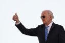 US President Joe Biden gives a thumbs up as he boards Air Force One at John F. Kennedy International Airport in New York