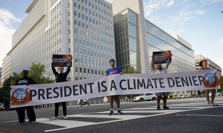 Climate change activists protest against World Bank President David Malpass in Washington