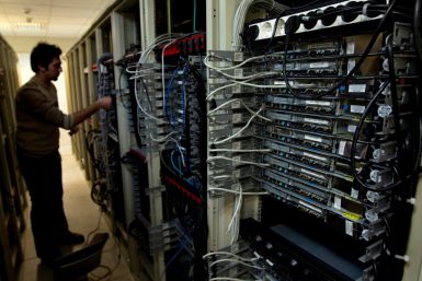 A computer engineer checks equipment at an internet service provider in Tehran February 15, 2011