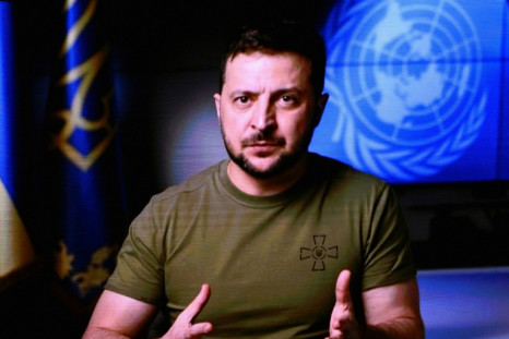 Ukrainian President Volodymyr Zelensky is seen on a screen as he remotely addresses the 77th session of the United Nations General Assembly on September 21, 2022