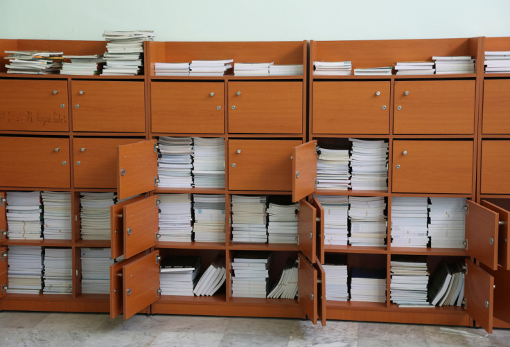 Books are seen in shelves at a closed public school in Beirut