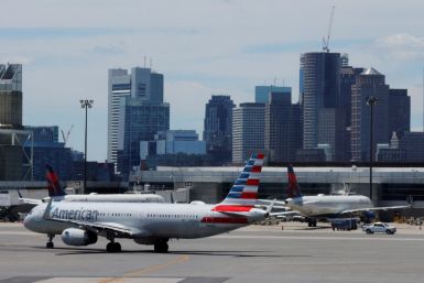 Travelers at Logan Airport ahead of the July 4th holiday weekend in Boston