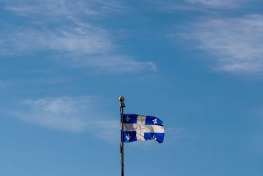 A flag of Quebec flies near the Regional Parliament building ahead of the G7 Summit in Quebec