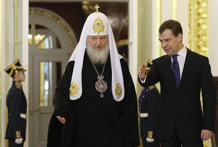 Russian Orthodox Patriach Kirill (L)