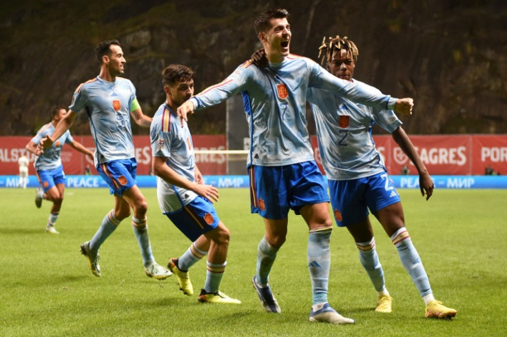 Alvaro Morata (C) snatched a late winner as Spain qualified for the Nations League finals in place of Portugal