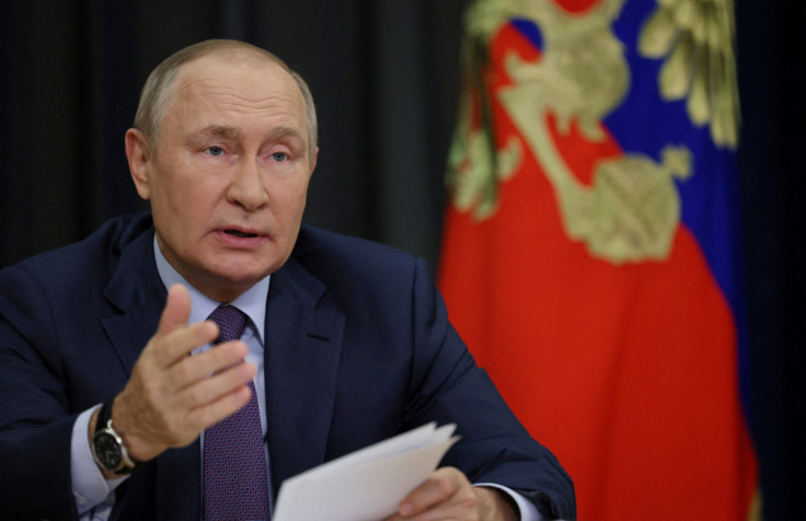 Russian President Vladimir Putin chairs a meeting via video link in Sochi