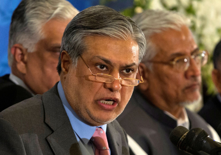 Pakistan's Finance Minister Dar announces the result of the first auction for 3G mobile phone networks during a news conference in Islamabad