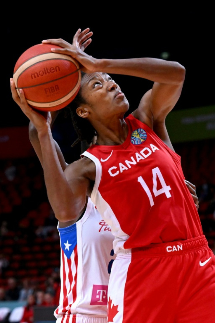 Canada cruised into the women's basketball World Cup semi-finals by beating Puerto Rico