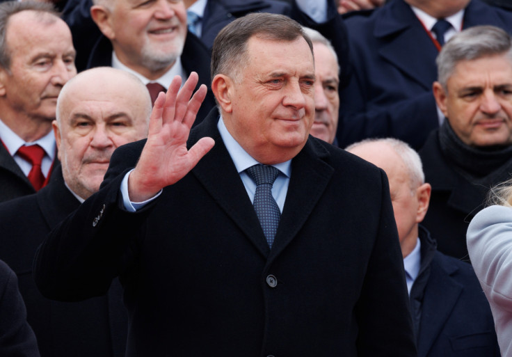 Bosnia's member of tripartite presidency Milorad Dodik waves to people during parade celebrations to mark their autonomous Serb Republic's national holiday, in Banja Luka