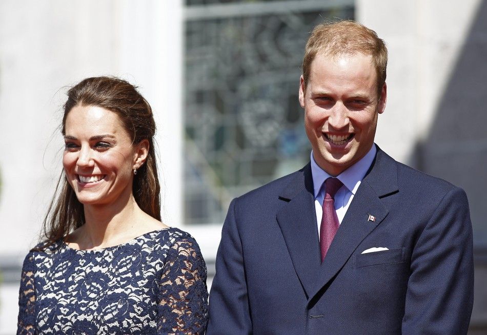 Britains Prince William and his wife Catherine, Duchess of Cambridge, take part in an official welcoming ceremony at Rideau Hall in Ottawa