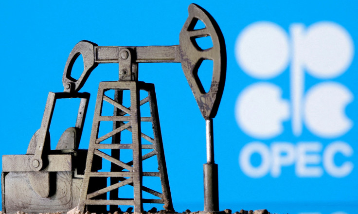 A 3D-printed oil pump jack in front of the OPEC logo in this illustration picture