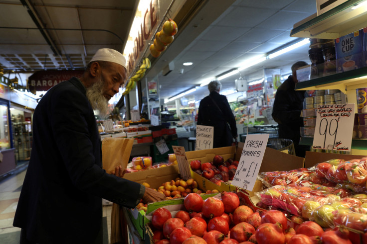 Food items are displayed for sale at a market stall in Sunderland, Britain