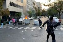 A picture obtained by AFP outside Iran shows a bin burning in a Tehran street during the protests over Mahsa Amini's death