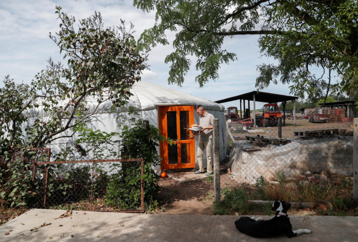 Mihaly Pogany leaves his yurt tent on his farm near Kecskemet