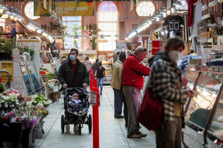 People shop at the Eastern Market in Washington