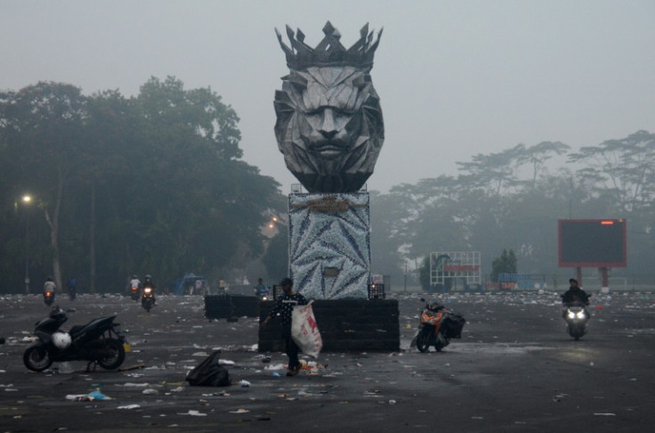 Anger spread outside the stadium. Supporters threw any item they could find -- rocks, plastic bottles -- at police.