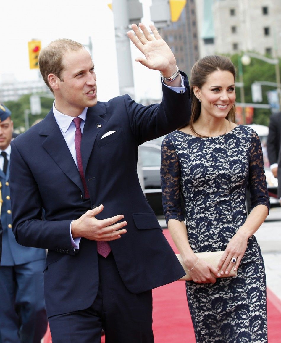  Britains Prince William and his wife Catherine, Duchess of Cambridge arrive at the National War Memorial in Ottawa