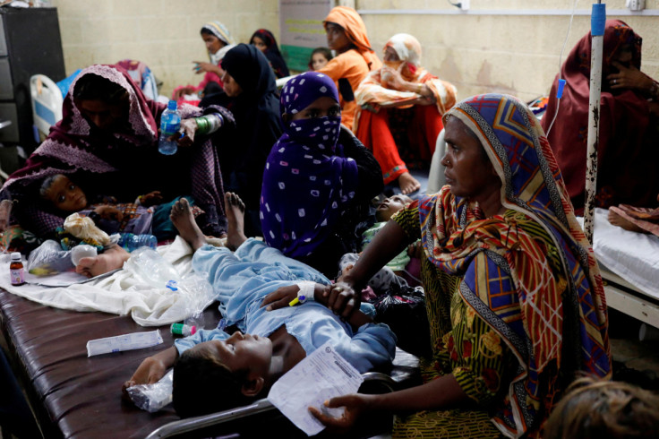 Children, suffering from malaria and fever, receive medical assistance at Sayed Abdullah Shah Institute of Medical Sciences in Sehwan