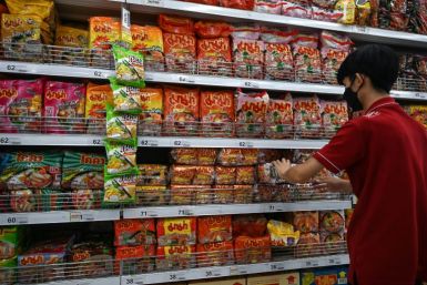 A shelf stocked with instant noodles at a Bangkok supermarket -- inflation has surged around the world