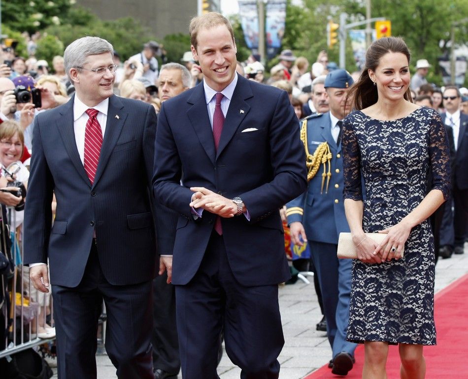 Canadas Prime Minister Harper, Britains Prince William and his wife Catherine, Duchess of Cambridge arrive at the National War Memorial in Ottawa