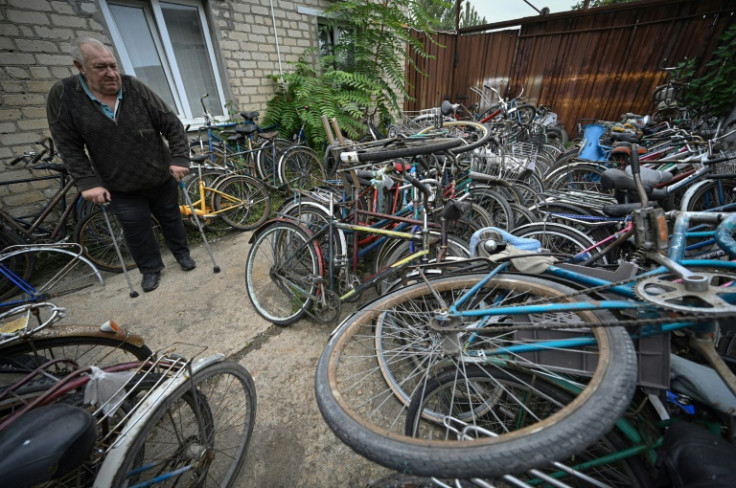Dmytro Kostenko with some of the abandoned bikes
