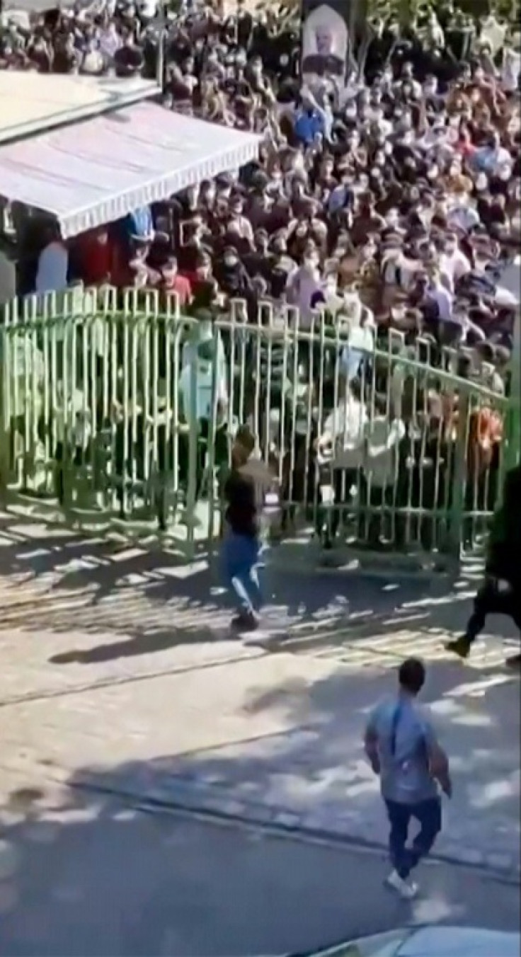 This image taken from a video posted online on October 2, 2022 shows Iranian students protesting at the University of Isfahan in the Islamic republic's central city