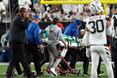 Miami quarterback Tua Tagovailoa, taken off the field in a stretcher with a concussion at Cincinnati, was ruled out for the Dolphins' next game against the New York Jets by coach Mike McDaniel